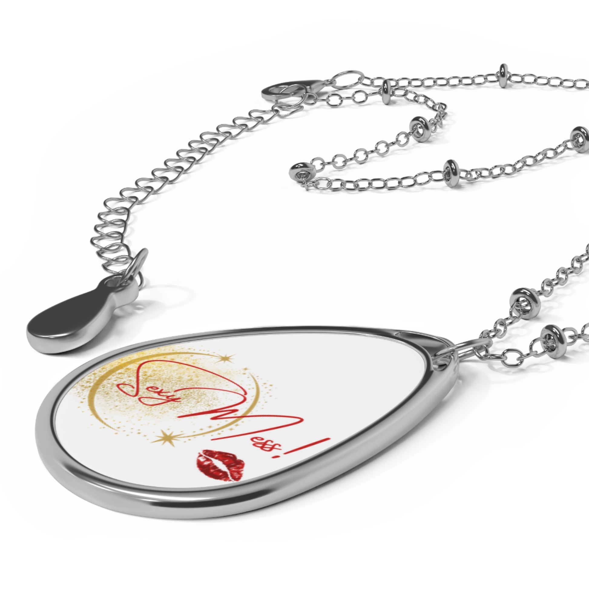 Close-up of Sexy Mess oval pendant necklace styled with minimalist outfit
