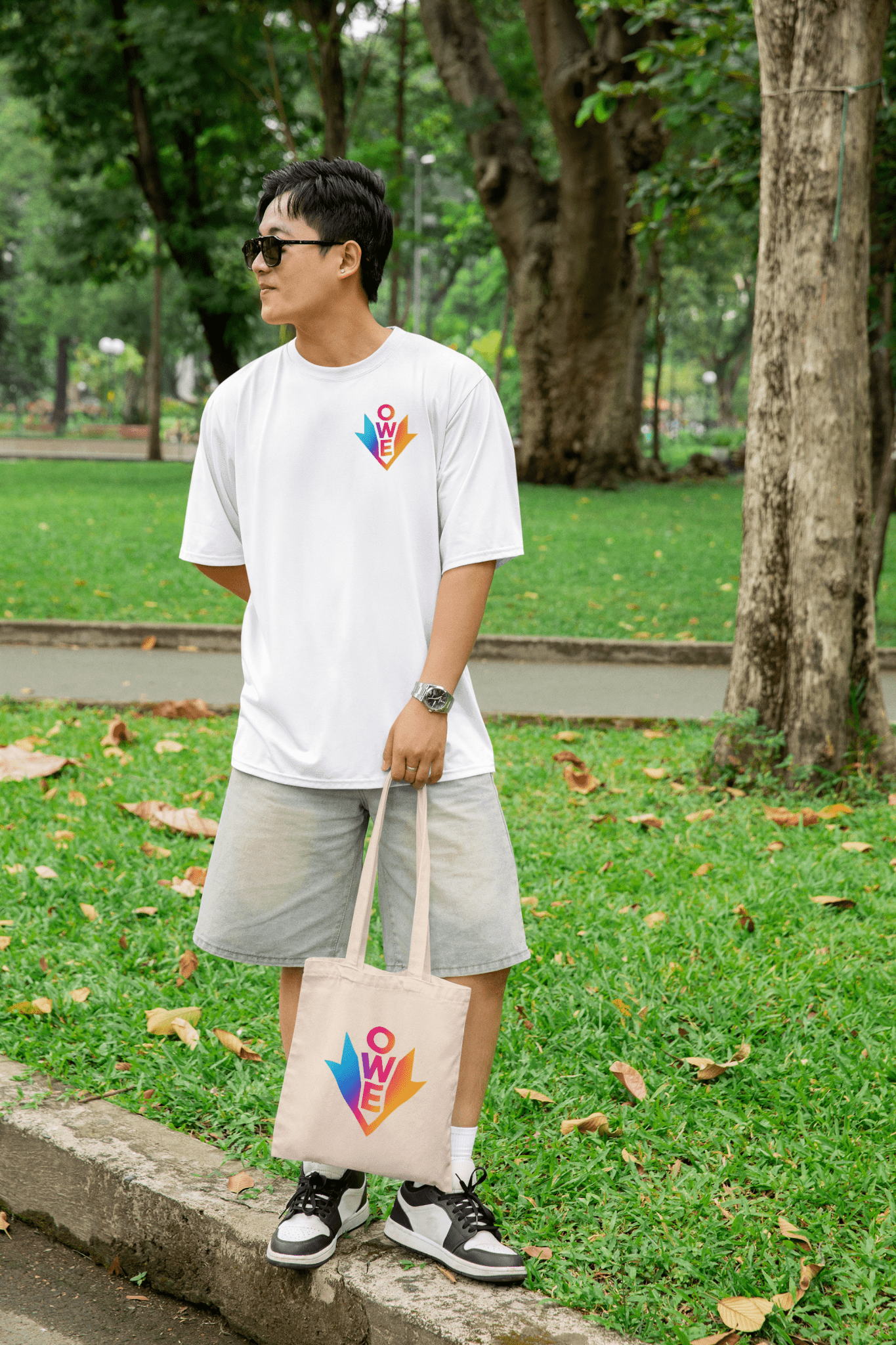 O.W.E. Vibe Shift Tee – Colorful Energy Drop by Out.Work.Everyone – T-Shirt